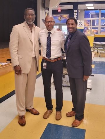 Mr. Paul Davis (center) stands with Executive Director Kenneth Reddick (left) and Region Superintendent Timothy Simmons.